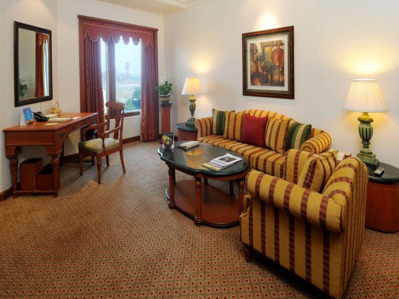 The Orchid Hotel Mumbai Vile Parle Kültér fotó A living room in a suite at the Taj Bengal